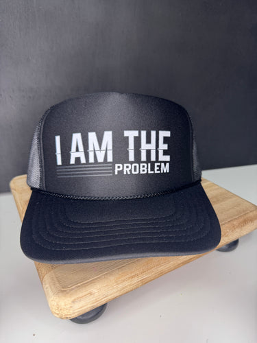 I AM THE PROBLEM Trucker Hat - Black