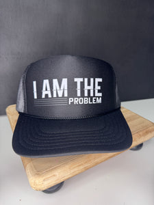 I AM THE PROBLEM Trucker Hat - Black